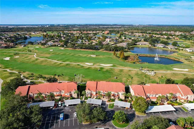 a kitchen with stainless steel appliances a refrigerator and a stove top oven