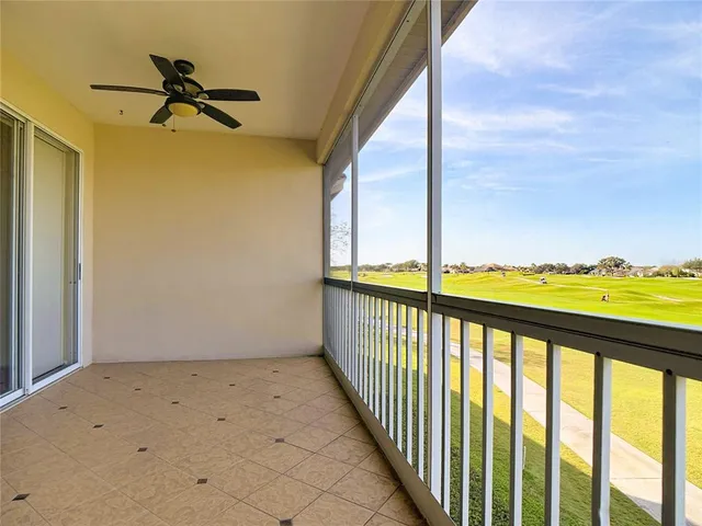 an aerial view of a house with a ocean view