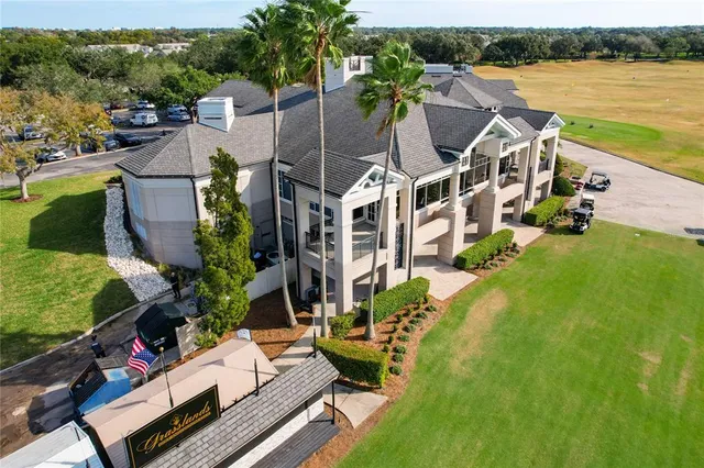 a view of a car parked in front of a houses