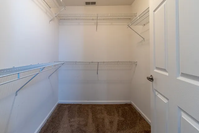 a view of a room with racks on the wall