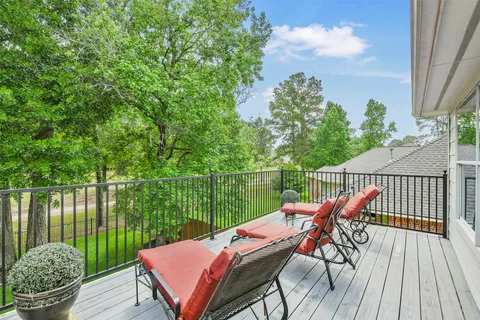 a view of a table and chairs on the roof deck