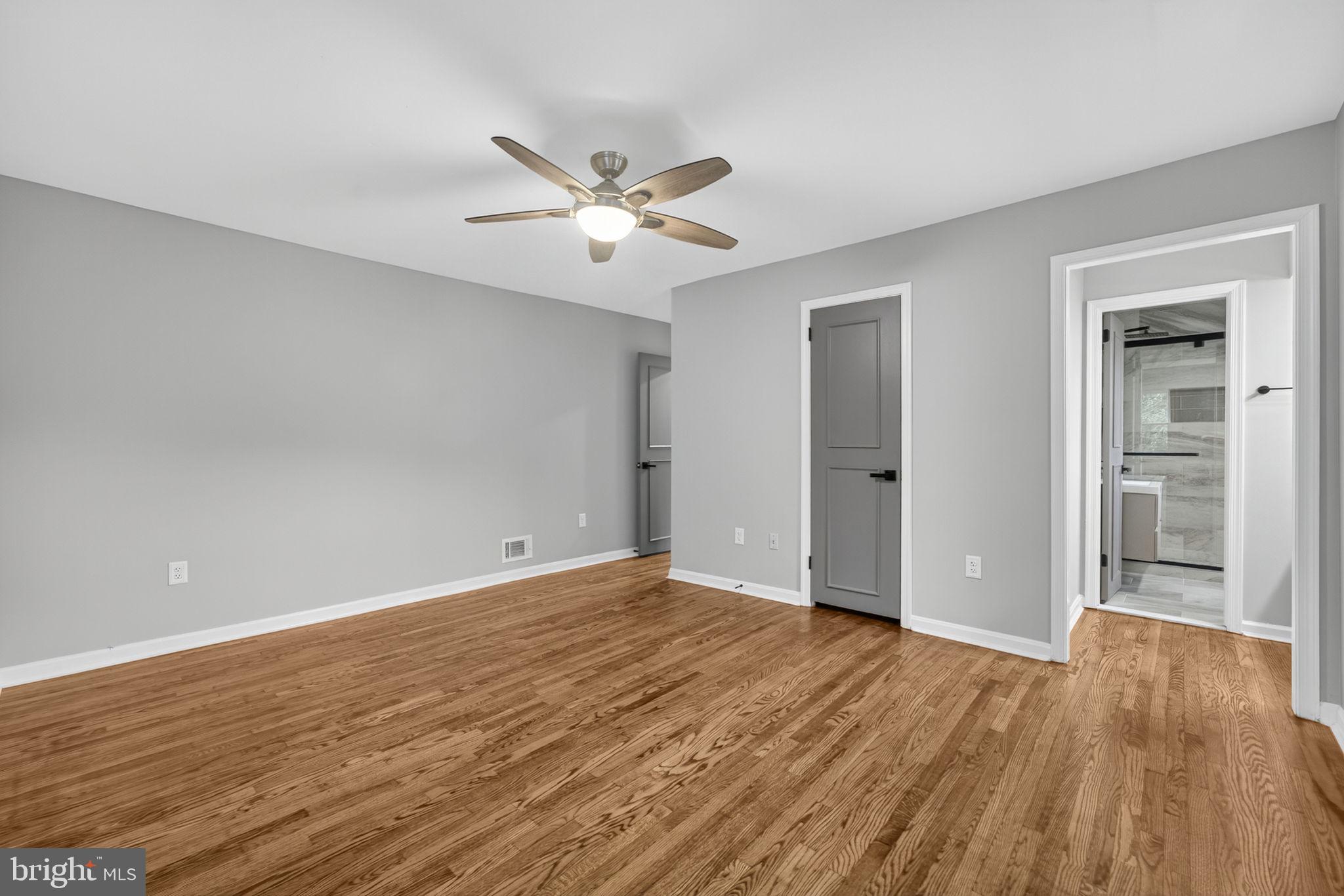 7009 Cold Spring Lane Alexandria, VA 22306 - Photo 16 of 30 a view of an empty room with wooden floor