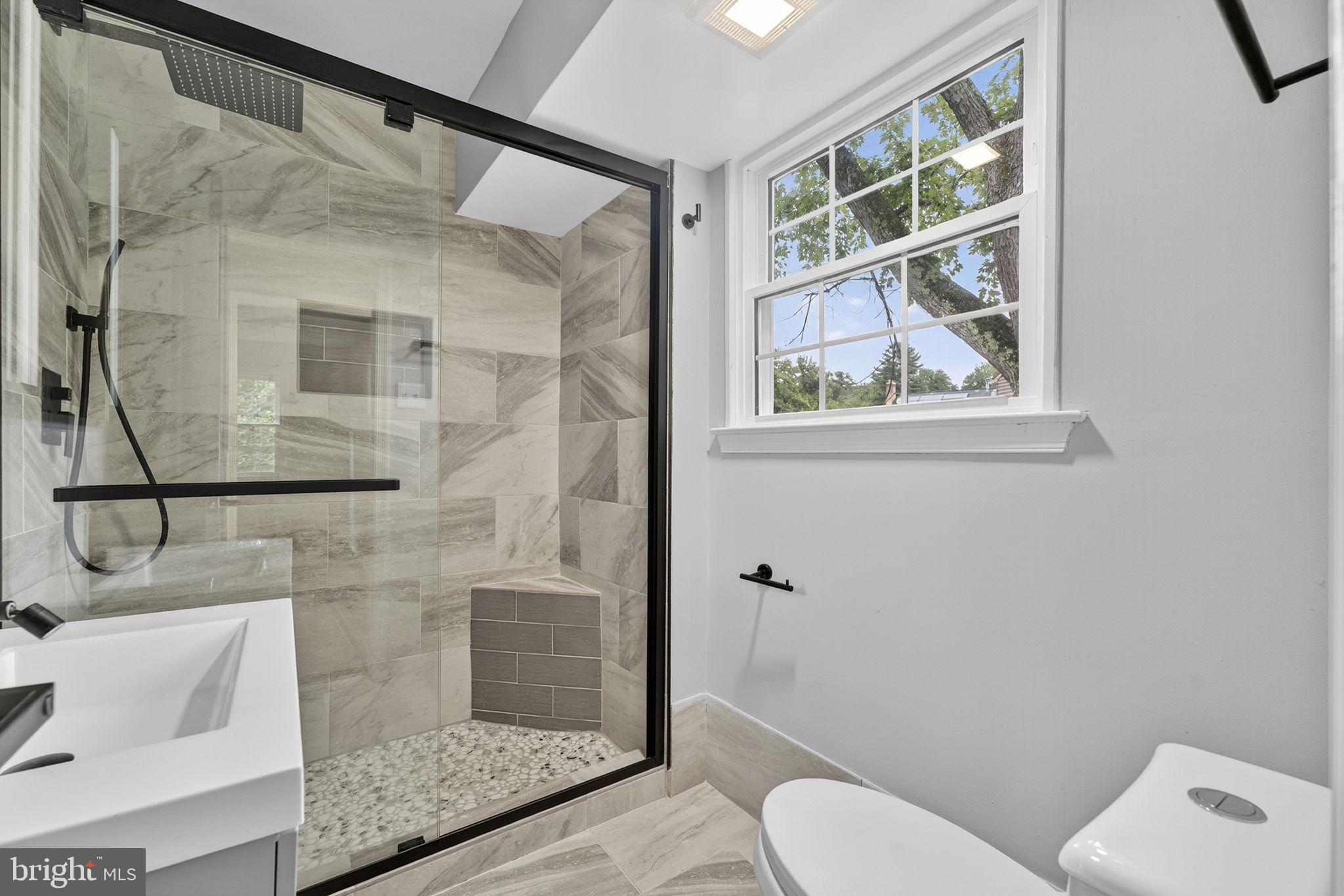 7009 Cold Spring Lane Alexandria, VA 22306 - Photo 18 of 30 a bathroom with a shower and toilet