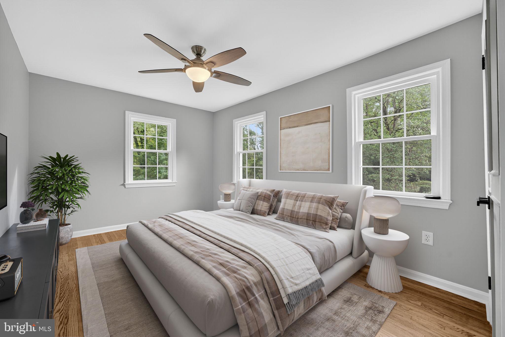 7009 Cold Spring Lane Alexandria, VA 22306 - Photo 19 of 30 a bedroom with a large bed and a window
