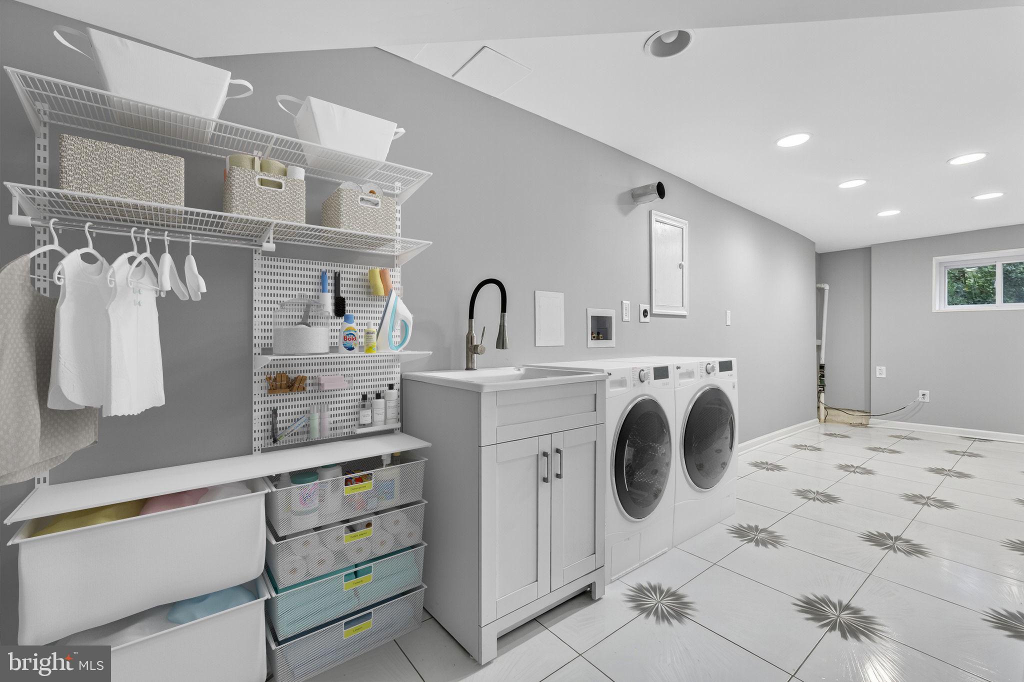 7009 Cold Spring Lane Alexandria, VA 22306 - Photo 24 of 30 a view of kitchen with washer and dryer