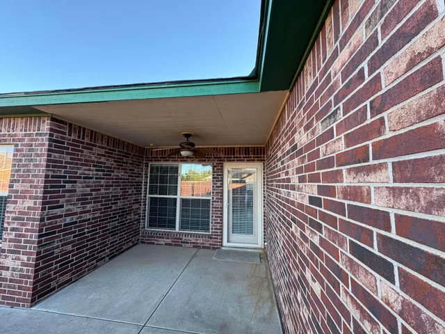 a view of door and wooden floor