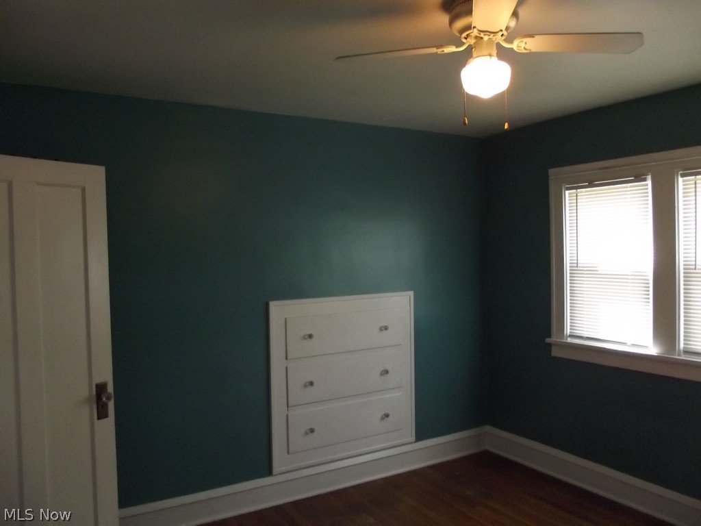 3363 Berea Road Cleveland, OH 44111 - Photo 28 of 50 Unfurnished room featuring dark hardwood / wood-style floors and ceiling fan