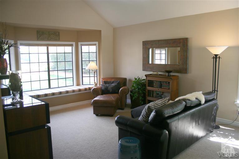 4218 Roxbury Street Simi Valley, CA 93063 - Photo 2 of 30 a living room with furniture and a flat screen tv