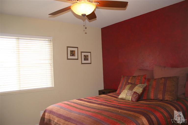 4218 Roxbury Street Simi Valley, CA 93063 - Photo 15 of 30 a bedroom with a bed and a window