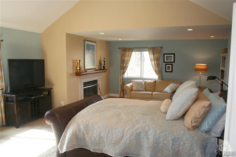4218 Roxbury Street Simi Valley, CA 93063 - Photo 17 of 30 a bedroom with a bed and a flat screen tv