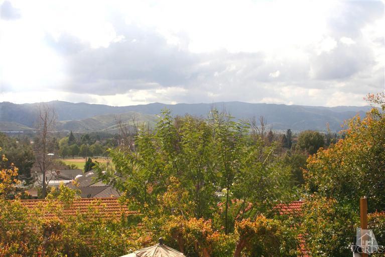 4218 Roxbury Street Simi Valley, CA 93063 - Photo 19 of 30 a view of a lake with mountains in the background