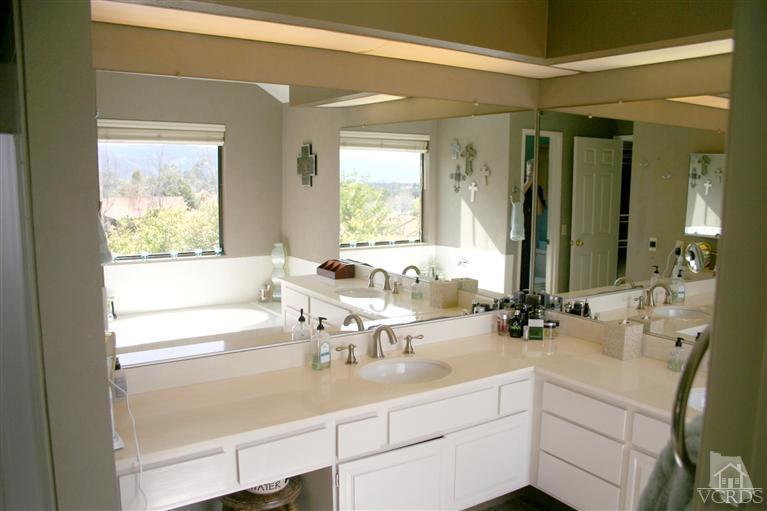4218 Roxbury Street Simi Valley, CA 93063 - Photo 20 of 30 a bathroom with a sink double vanity and a mirror