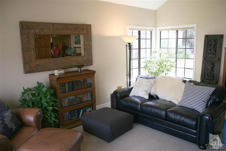4218 Roxbury Street Simi Valley, CA 93063 - Photo 3 of 30 a living room with furniture and a flat screen tv