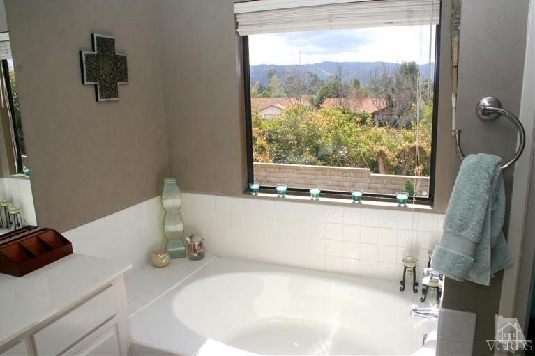4218 Roxbury Street Simi Valley, CA 93063 - Photo 21 of 30 a bathroom with a sink and a large window