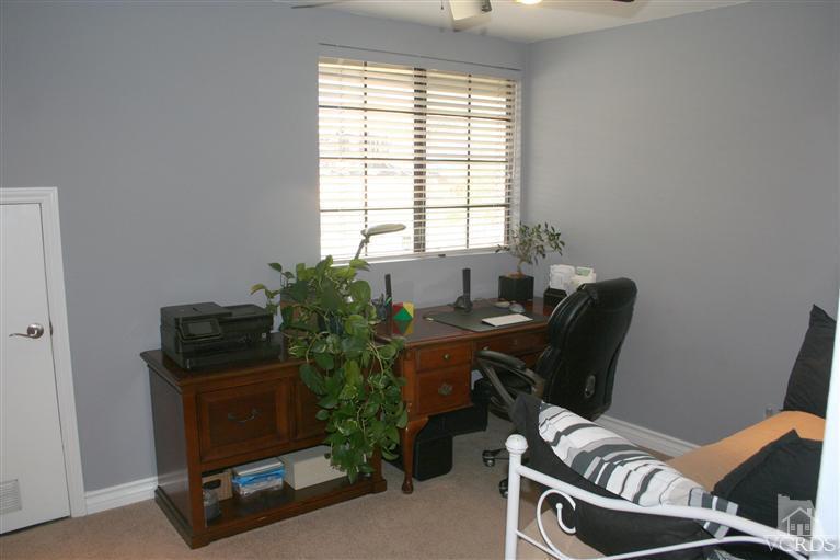 4218 Roxbury Street Simi Valley, CA 93063 - Photo 23 of 30 a view of a workspace with furniture and a window