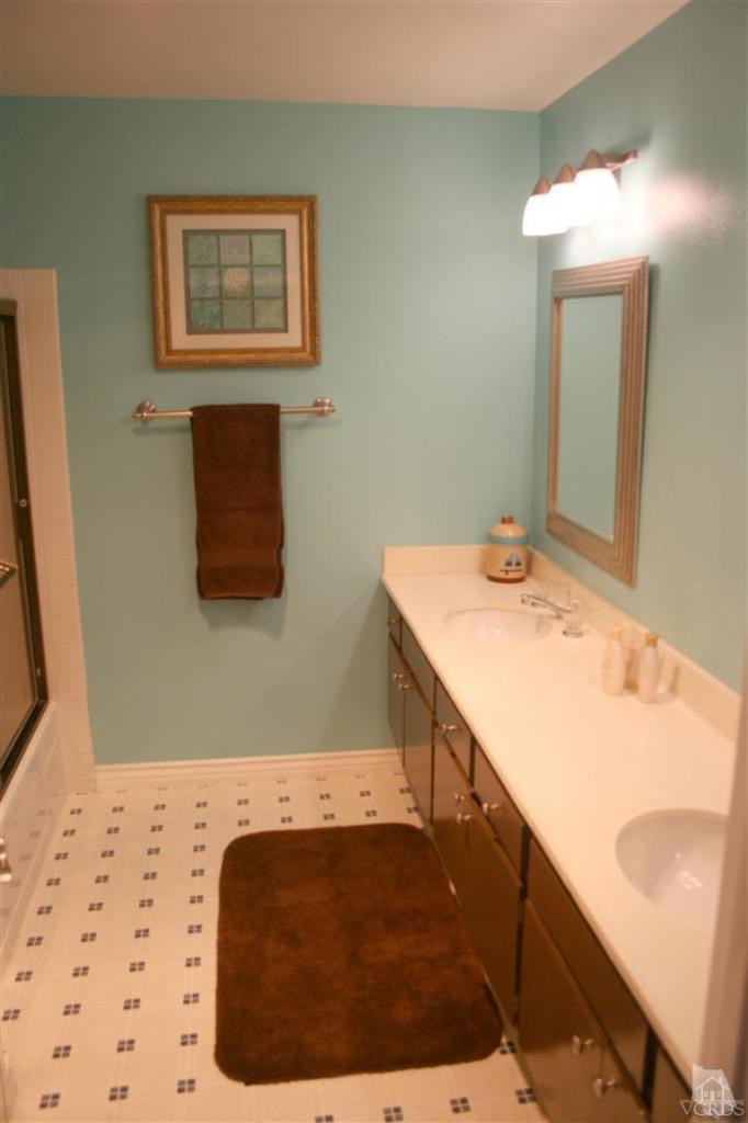 4218 Roxbury Street Simi Valley, CA 93063 - Photo 24 of 30 a bathroom with a sink and a mirror