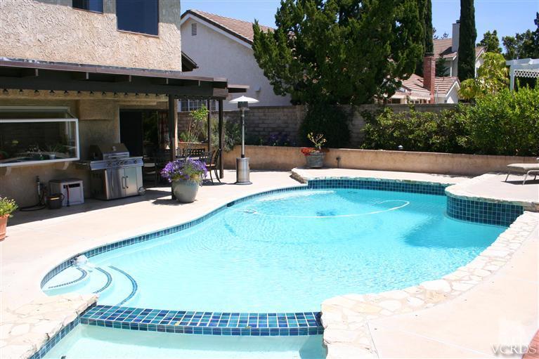 4218 Roxbury Street Simi Valley, CA 93063 - Photo 28 of 30 a view of a swimming pool with a patio