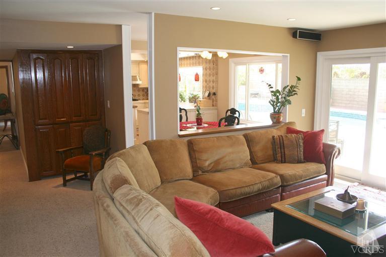 4218 Roxbury Street Simi Valley, CA 93063 - Photo 10 of 30 a living room with furniture and a window