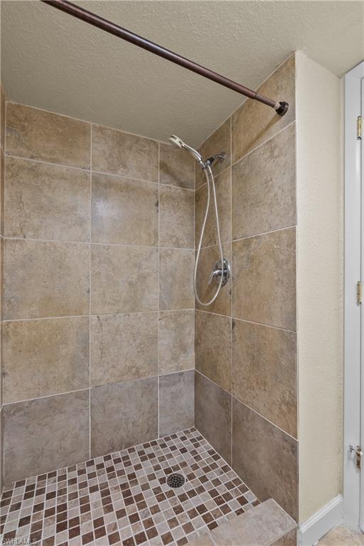 4615 Bayshore Drive, Unit E4 Naples, FL 34112 - Photo 15 of 30 a bathroom with a shower