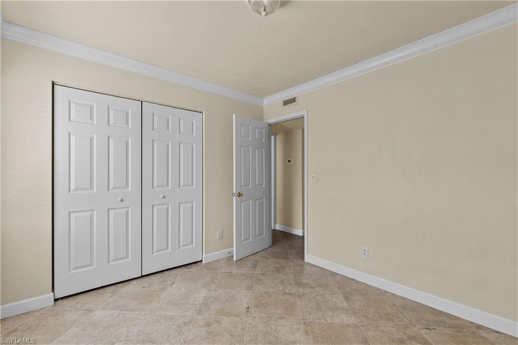 4615 Bayshore Drive, Unit E4 Naples, FL 34112 - Photo 19 of 30 a view of an empty room