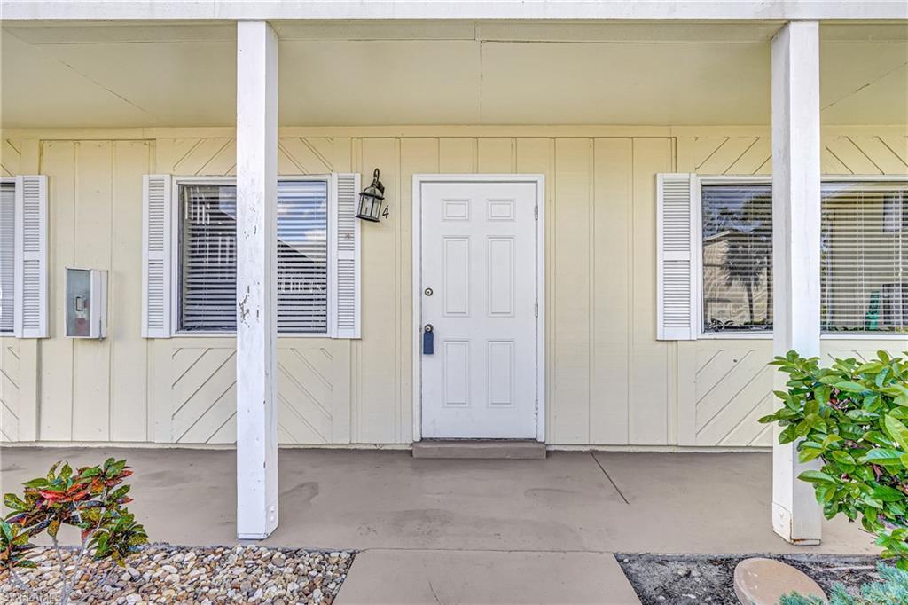 4615 Bayshore Drive, Unit E4 Naples, FL 34112 - Photo 28 of 30 a view of a door