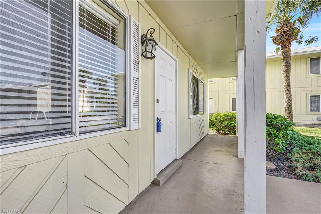 4615 Bayshore Drive, Unit E4 Naples, FL 34112 - Photo 30 of 30 a view of a house with a window