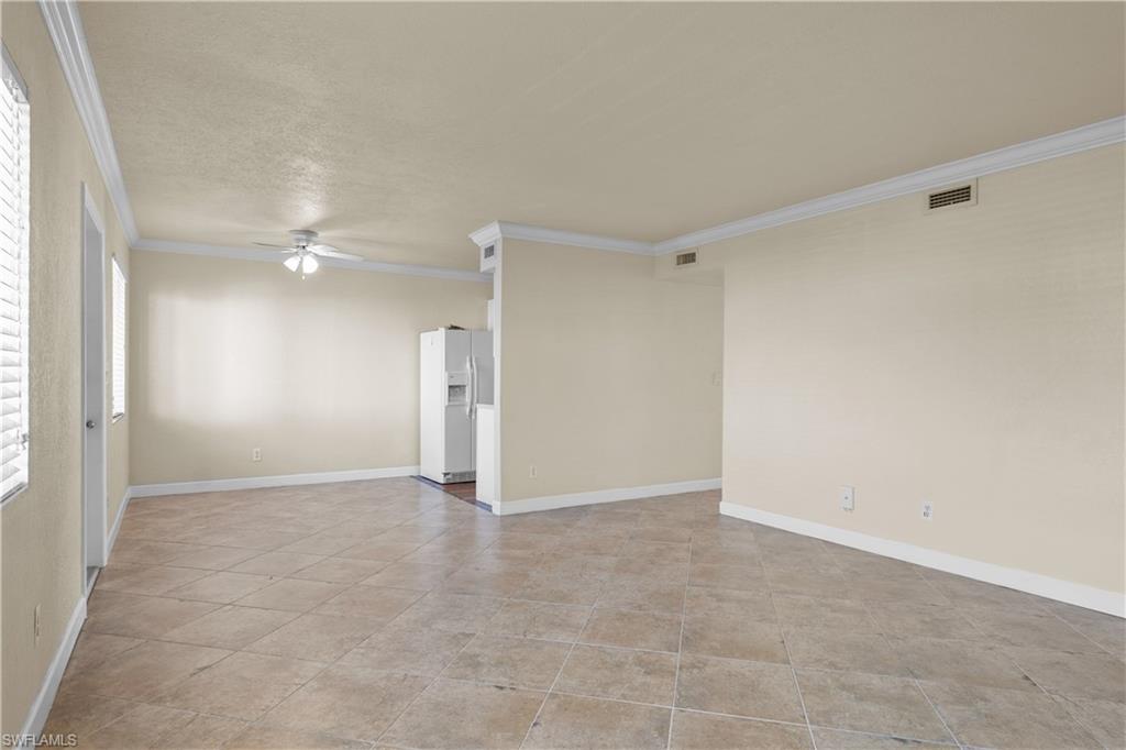 4615 Bayshore Drive, Unit E4 Naples, FL 34112 - Photo 7 of 30 a view of an empty room