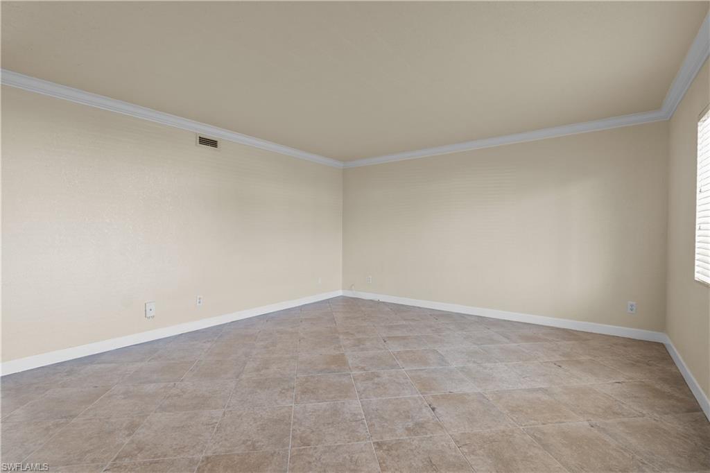 4615 Bayshore Drive, Unit E4 Naples, FL 34112 - Photo 9 of 30 a view of an empty room