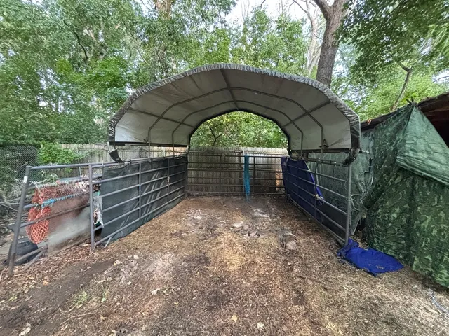 a view of a lake with houses in the back