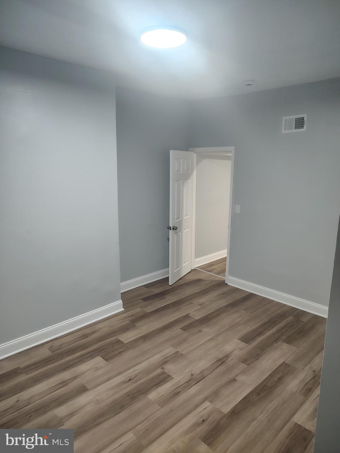 1114 North Bond Street, Unit 2 Baltimore, MD 21213 - Photo 10 of 13 Second bedroom