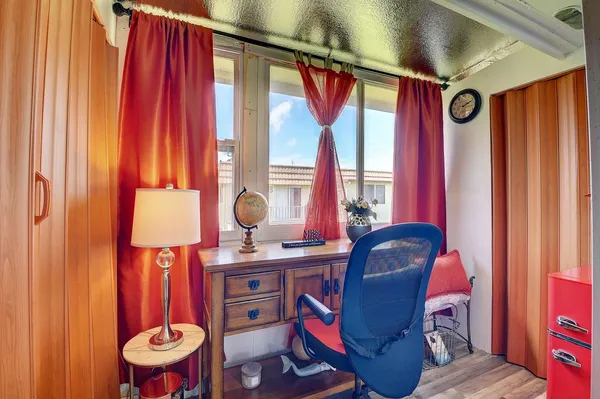 a view of a room that has a window in it