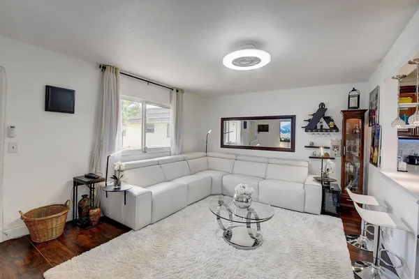 a living room with furniture and a couch