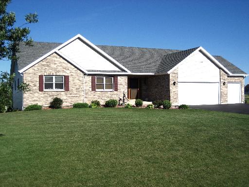 9403 Elizabeth Lane Spring Grove, IL 60081 - Photo 1 of 1 a front view of house with yard and green space