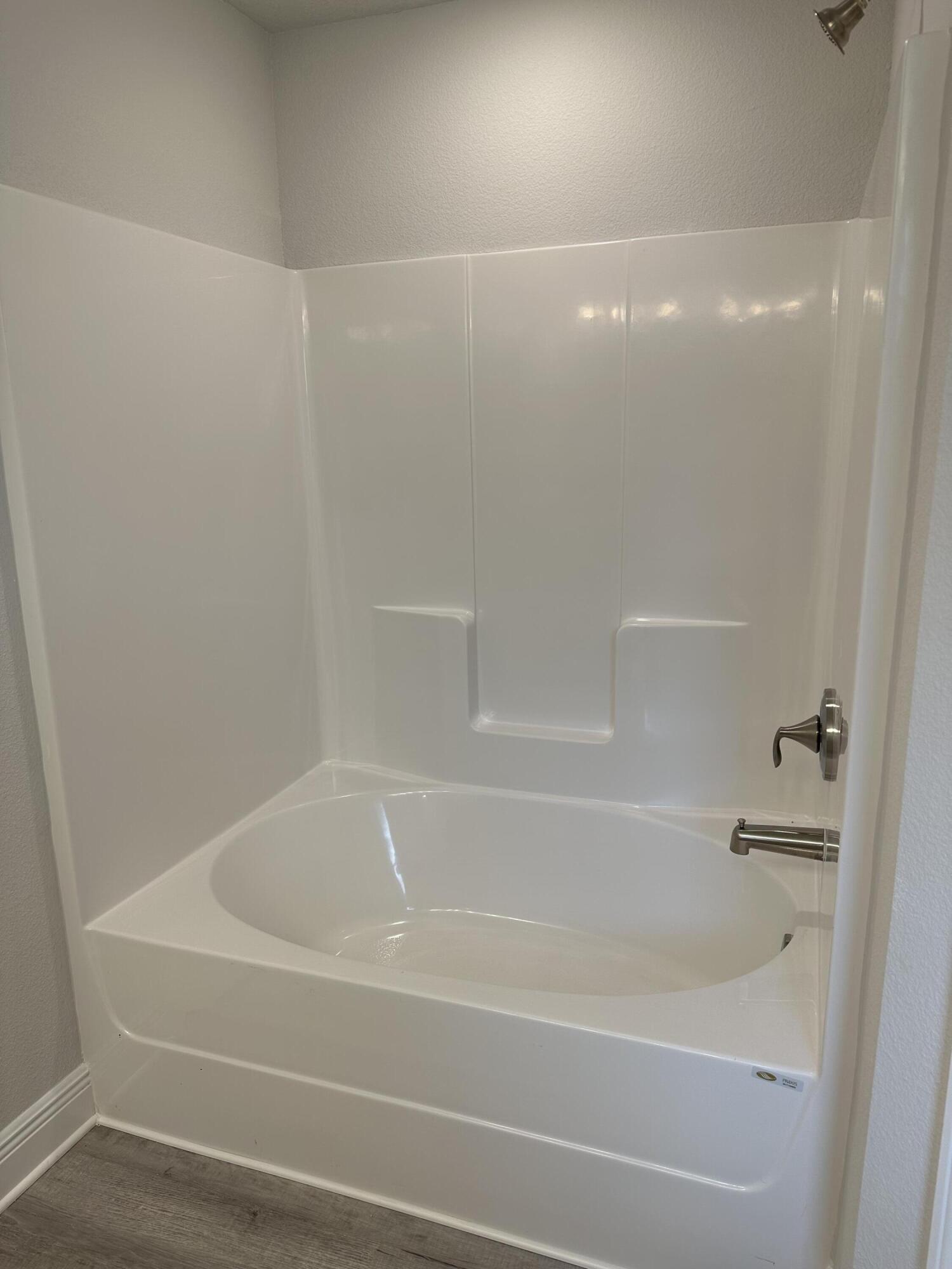 5287 Hidden Pines Circle Milton, FL 32583 - Photo 11 of 15 a close view of a bathtub in a bathroom