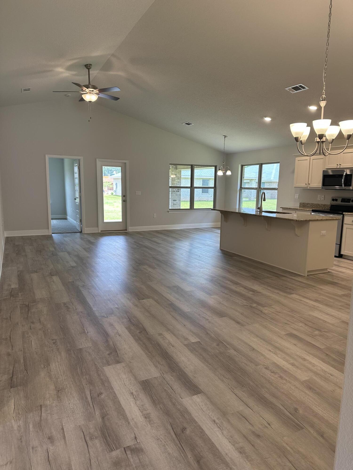 5287 Hidden Pines Circle Milton, FL 32583 - Photo 4 of 15 a view of a kitchen with a sink and a window