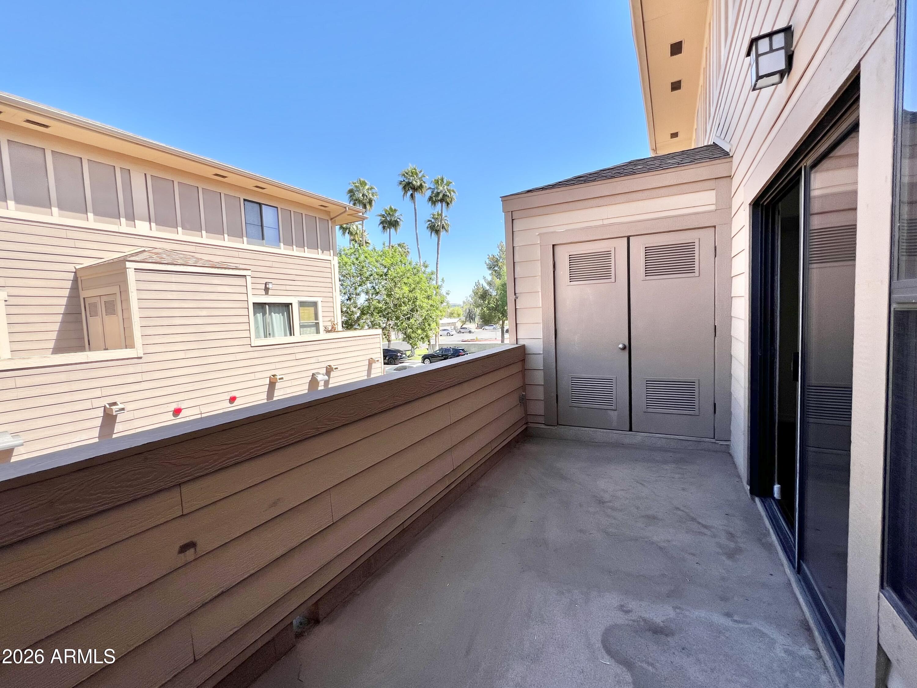 730 South Beck Avenue Tempe, AZ 85281 - Photo 19 of 29 a view of a house with a large window and potted plants