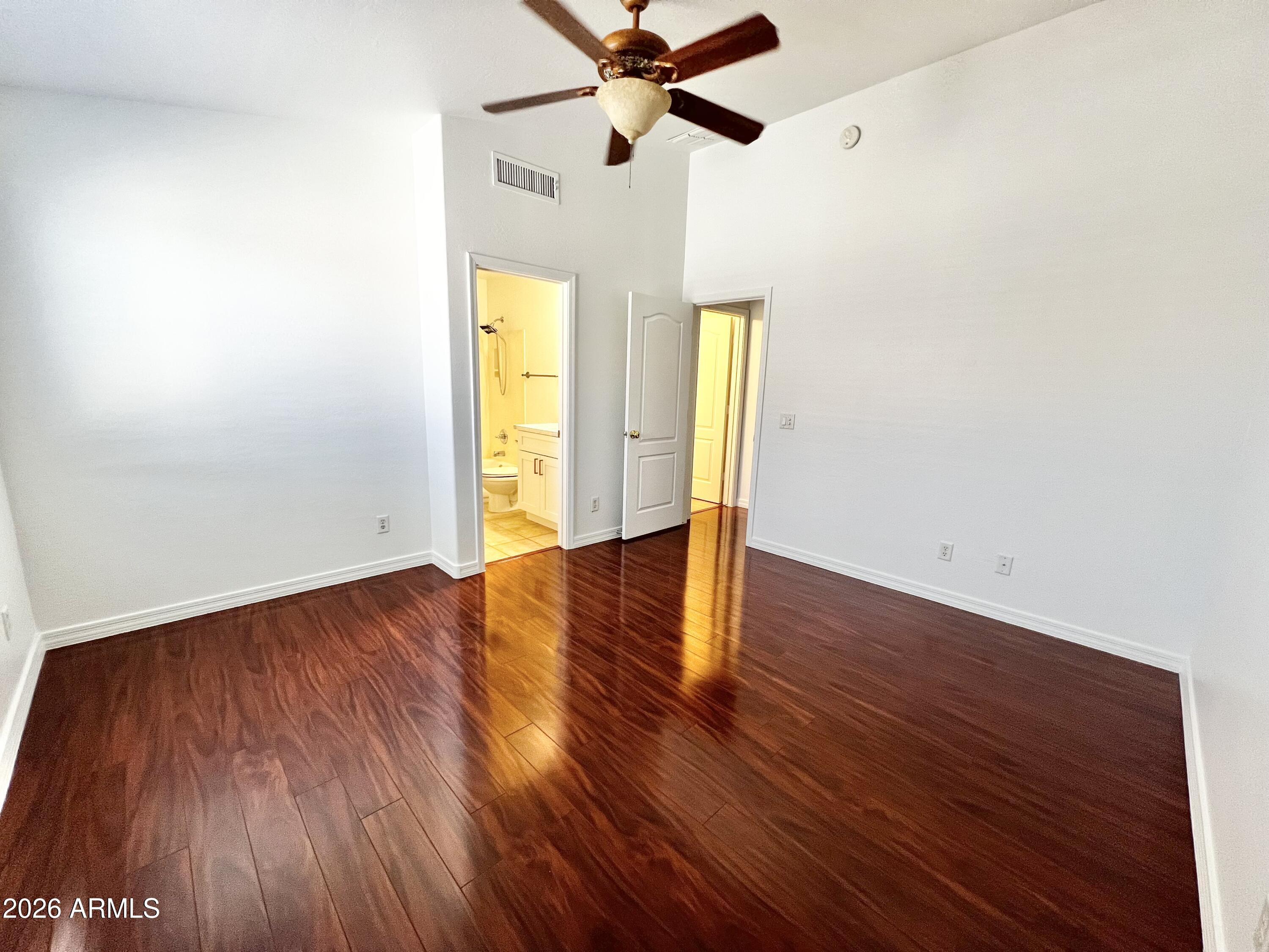730 South Beck Avenue Tempe, AZ 85281 - Photo 20 of 29 a view of empty room with wooden floor and fan