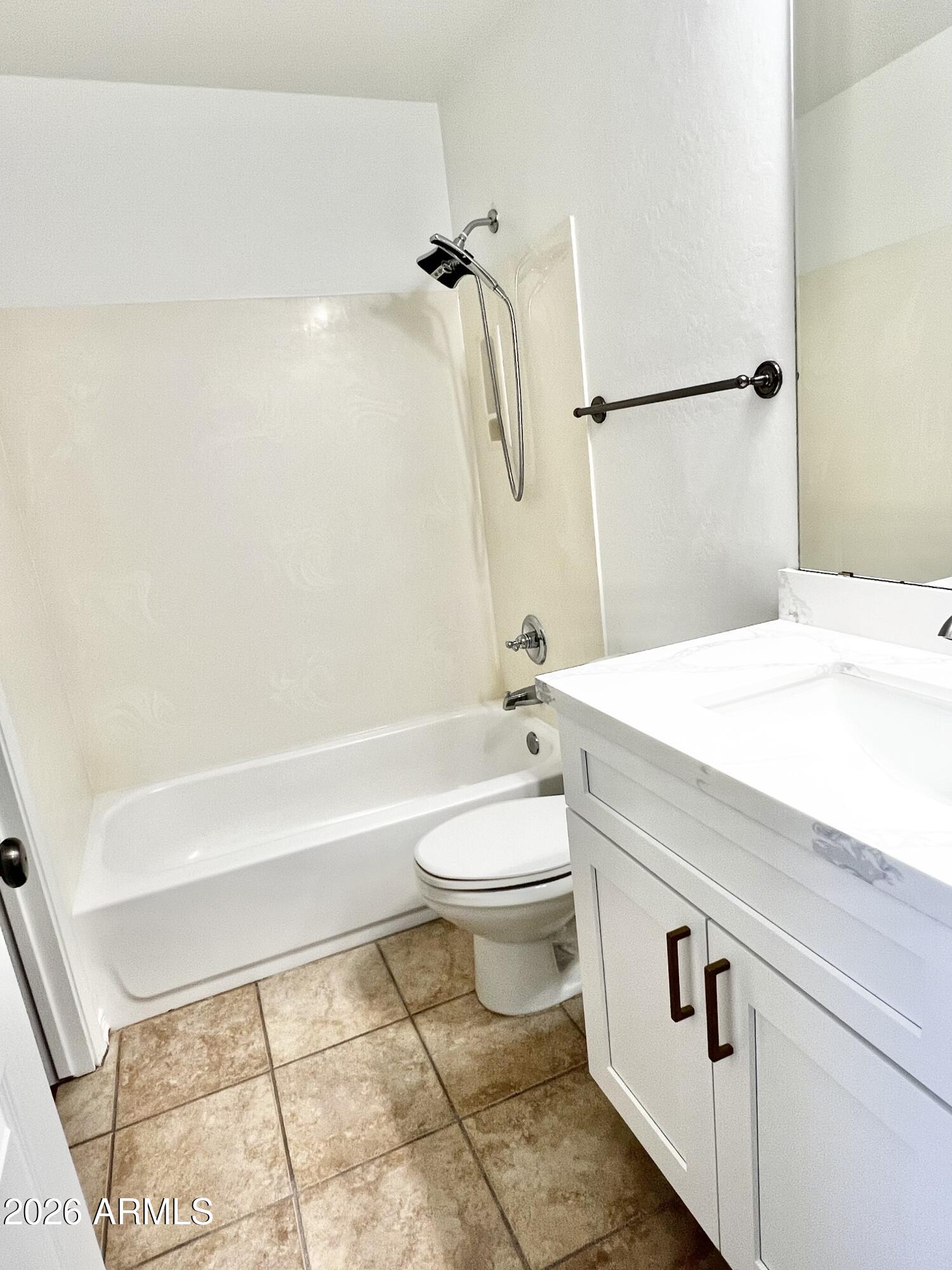 730 South Beck Avenue Tempe, AZ 85281 - Photo 23 of 29 a bathroom with a toilet a sink and bathtub