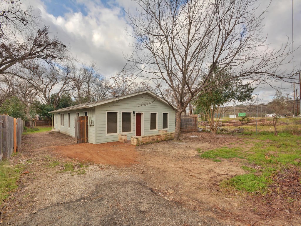 4609 Ledesma Road Austin, TX 78721 - Photo 1 of 1 a view of a house with a yard covered in snow