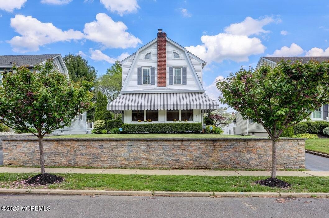 166 Grayson Avenue Hamilton, NJ 08619 - Photo 1 of 31 a front view of a house with a yard and potted plants