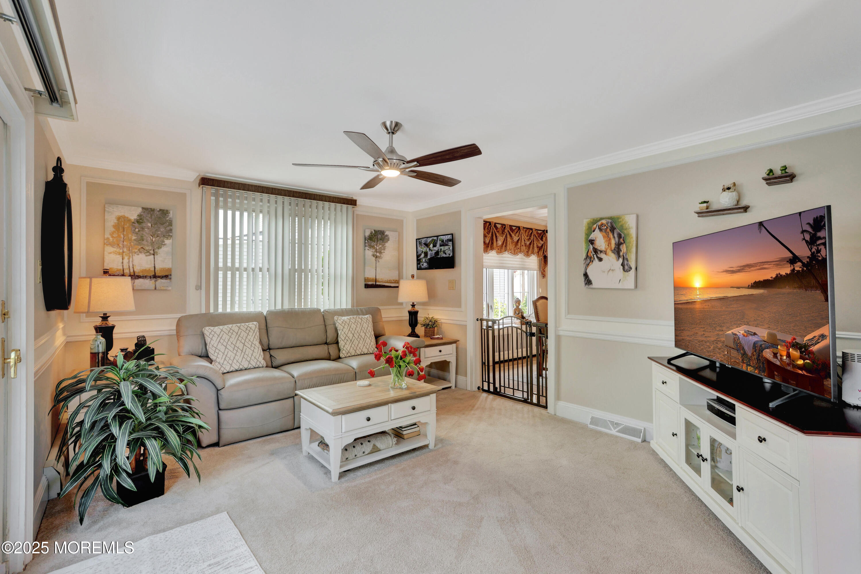 166 Grayson Avenue Hamilton, NJ 08619 - Photo 16 of 31 a living room with furniture and a flat screen tv