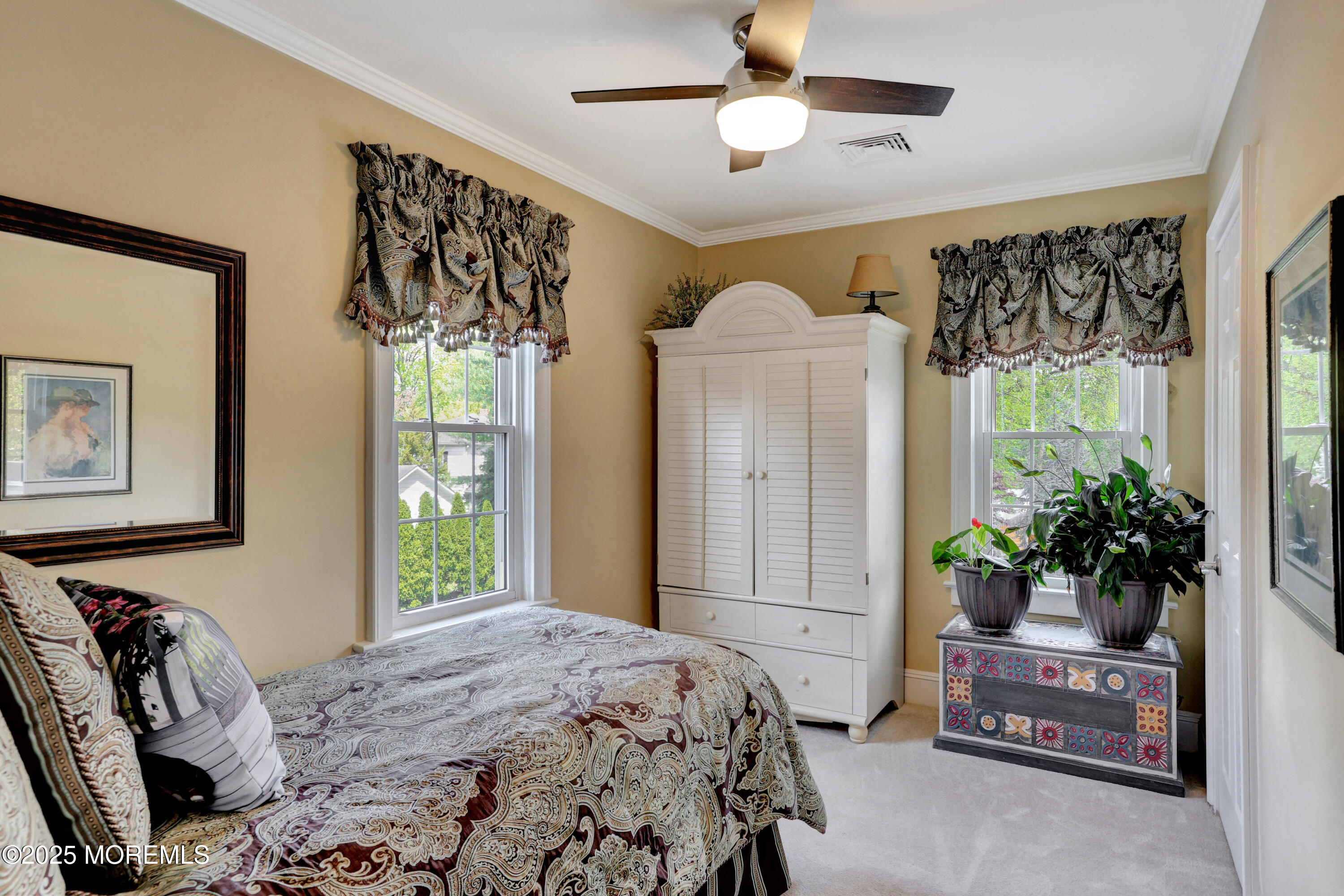 166 Grayson Avenue Hamilton, NJ 08619 - Photo 17 of 31 a bedroom with a bed and a couch