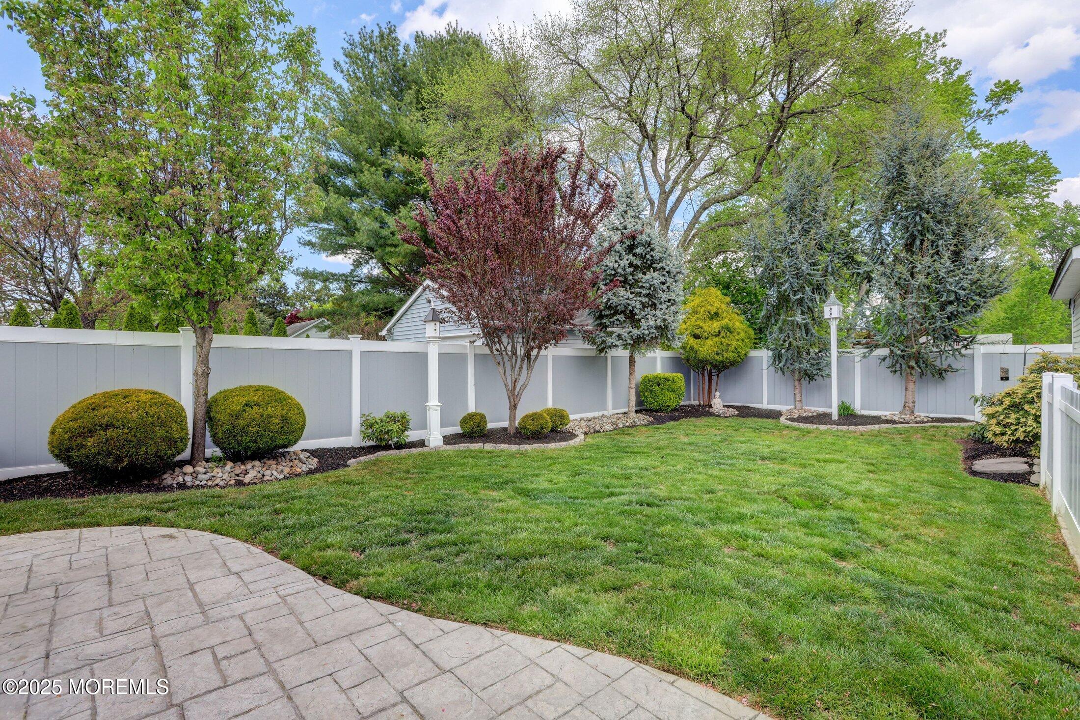 166 Grayson Avenue Hamilton, NJ 08619 - Photo 26 of 31 a front view of a house with garden