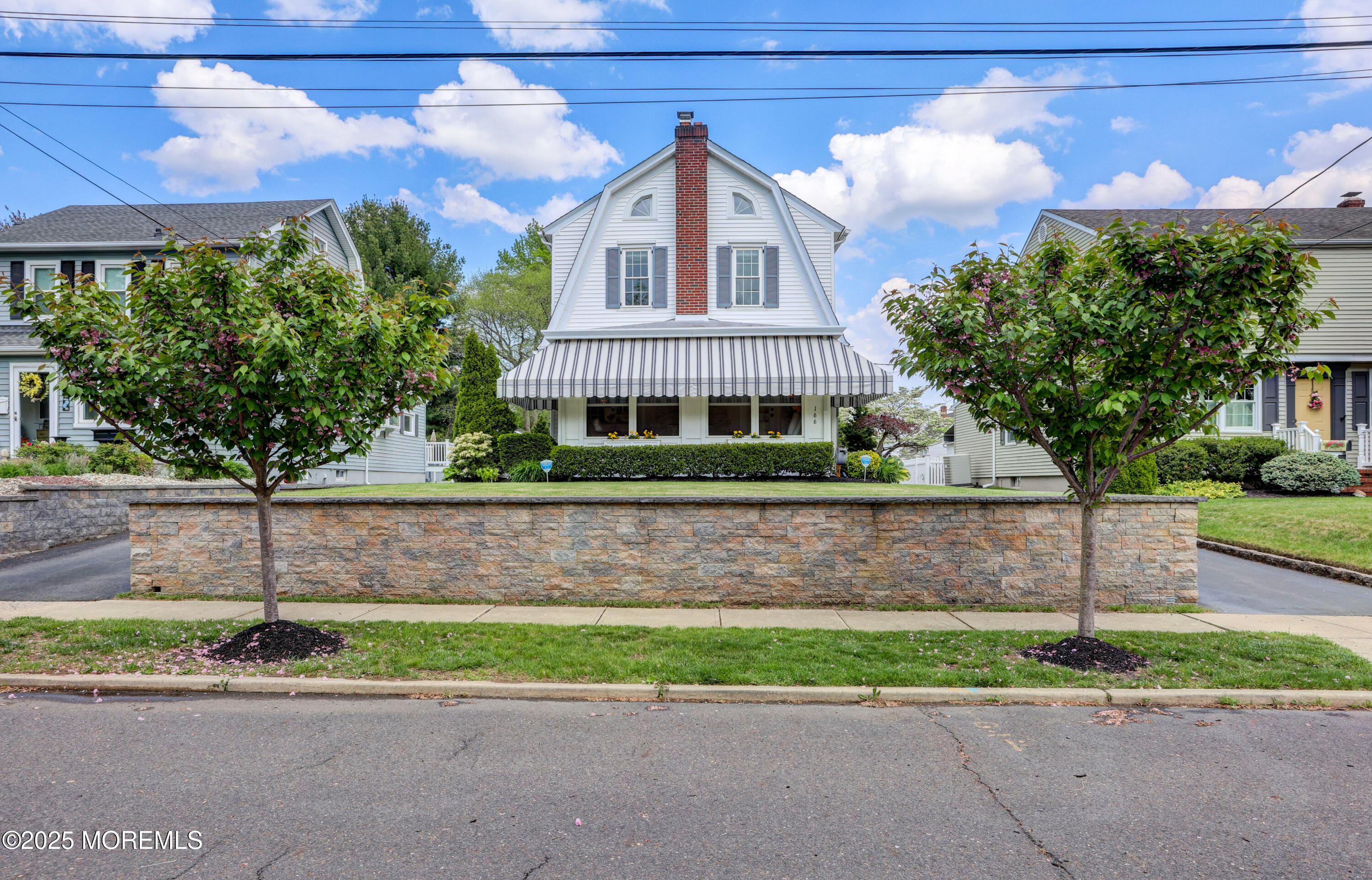 166 Grayson Avenue Hamilton, NJ 08619 - Photo 3 of 31 a front view of a house with a yard and a garage
