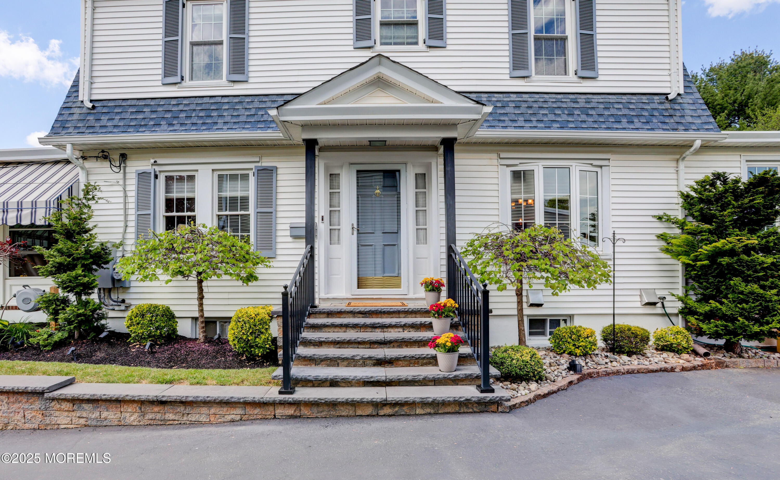 166 Grayson Avenue Hamilton, NJ 08619 - Photo 5 of 31 a front view of a house with a garden