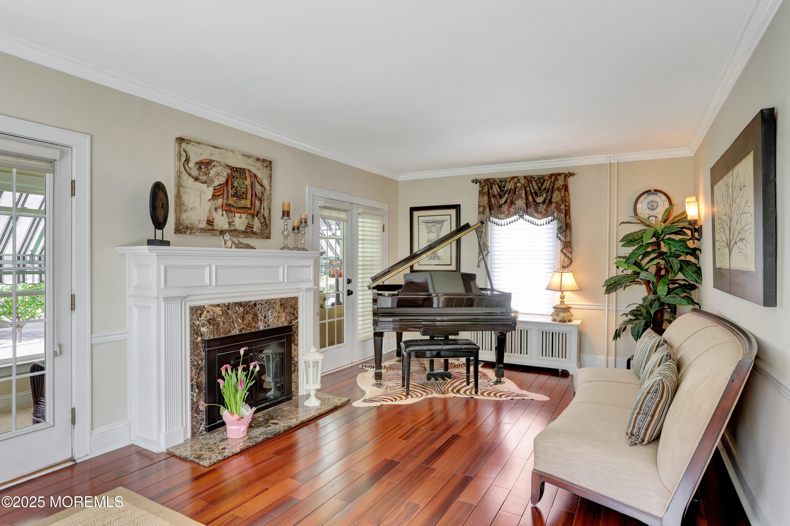 166 Grayson Avenue Hamilton, NJ 08619 - Photo 6 of 31 a living room with furniture and a fireplace