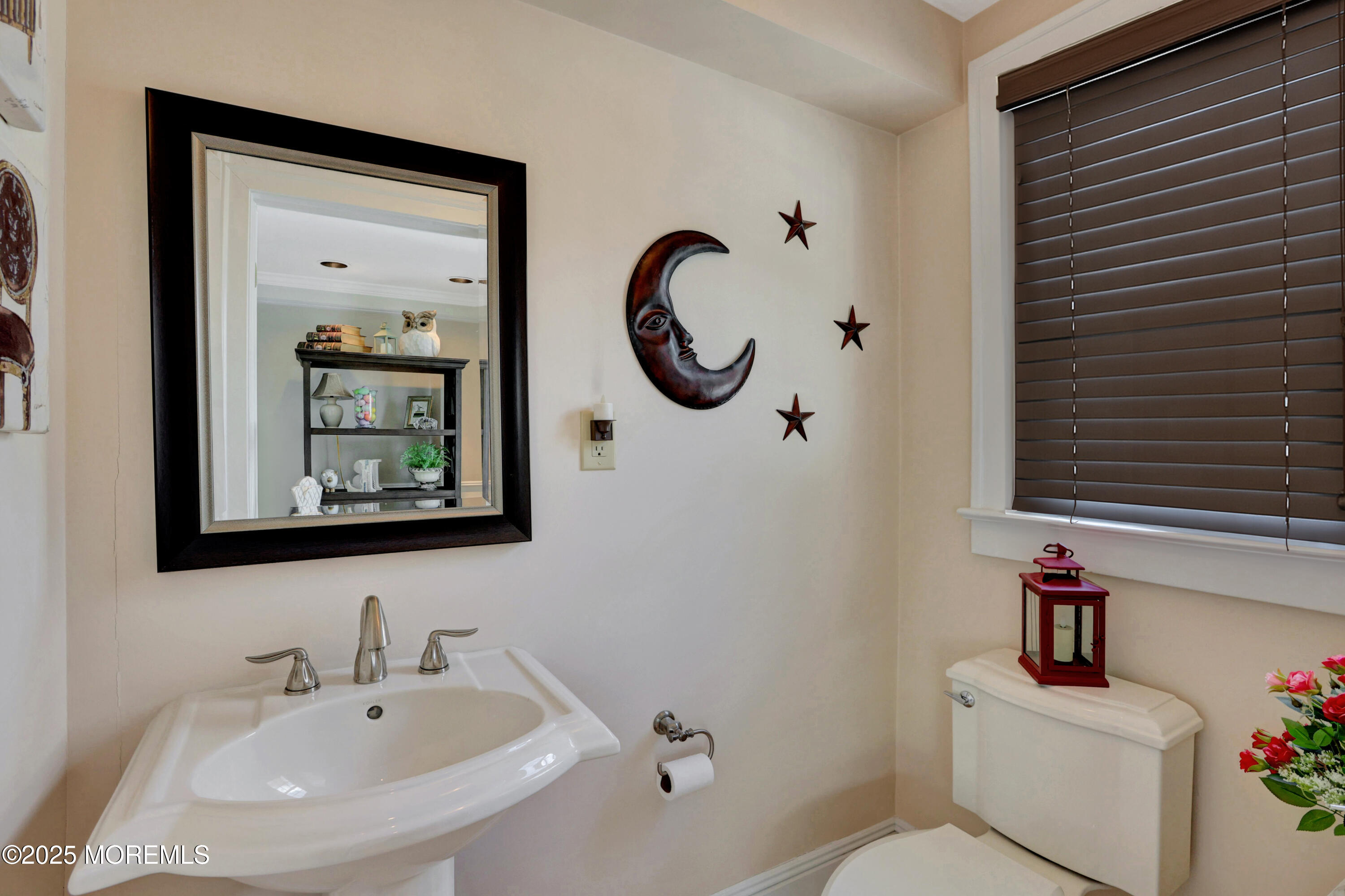 166 Grayson Avenue Hamilton, NJ 08619 - Photo 7 of 31 a bathroom with a toilet sink and mirror