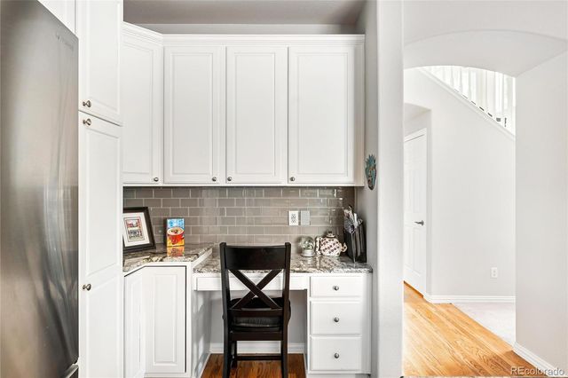 a close view of a utility room with washer and dryer