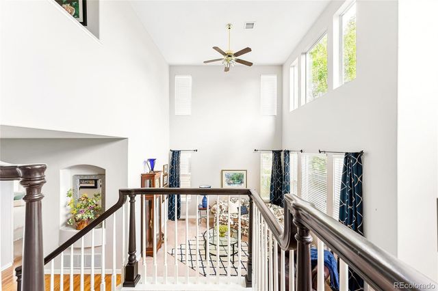 a view of a hallway with windows