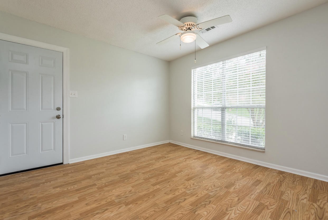 4337 Walnut Ridge Lane Knoxville, TN 37921 - Photo 9 of 24 a view of an empty room with a window